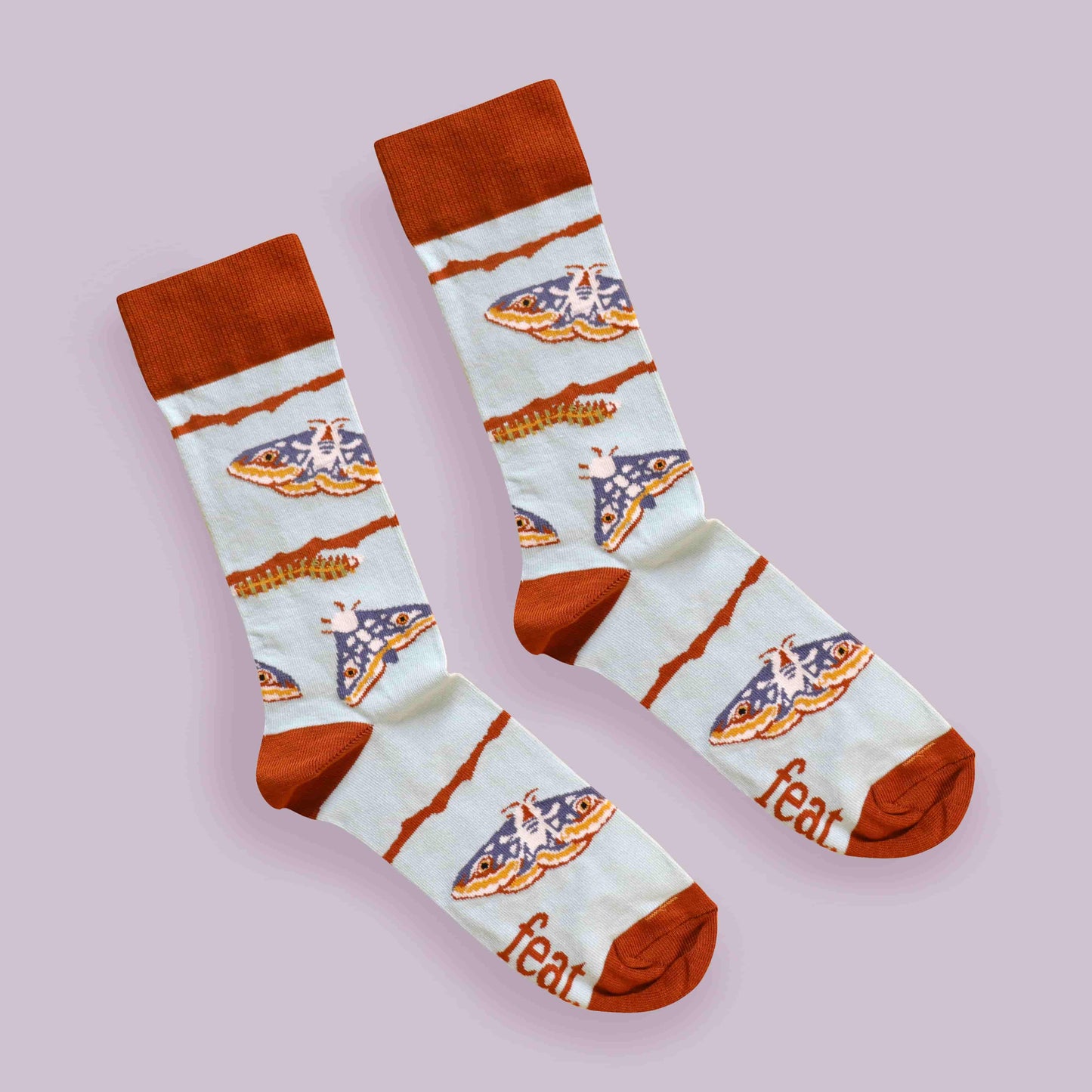 Moth socks diagonal image lilac background