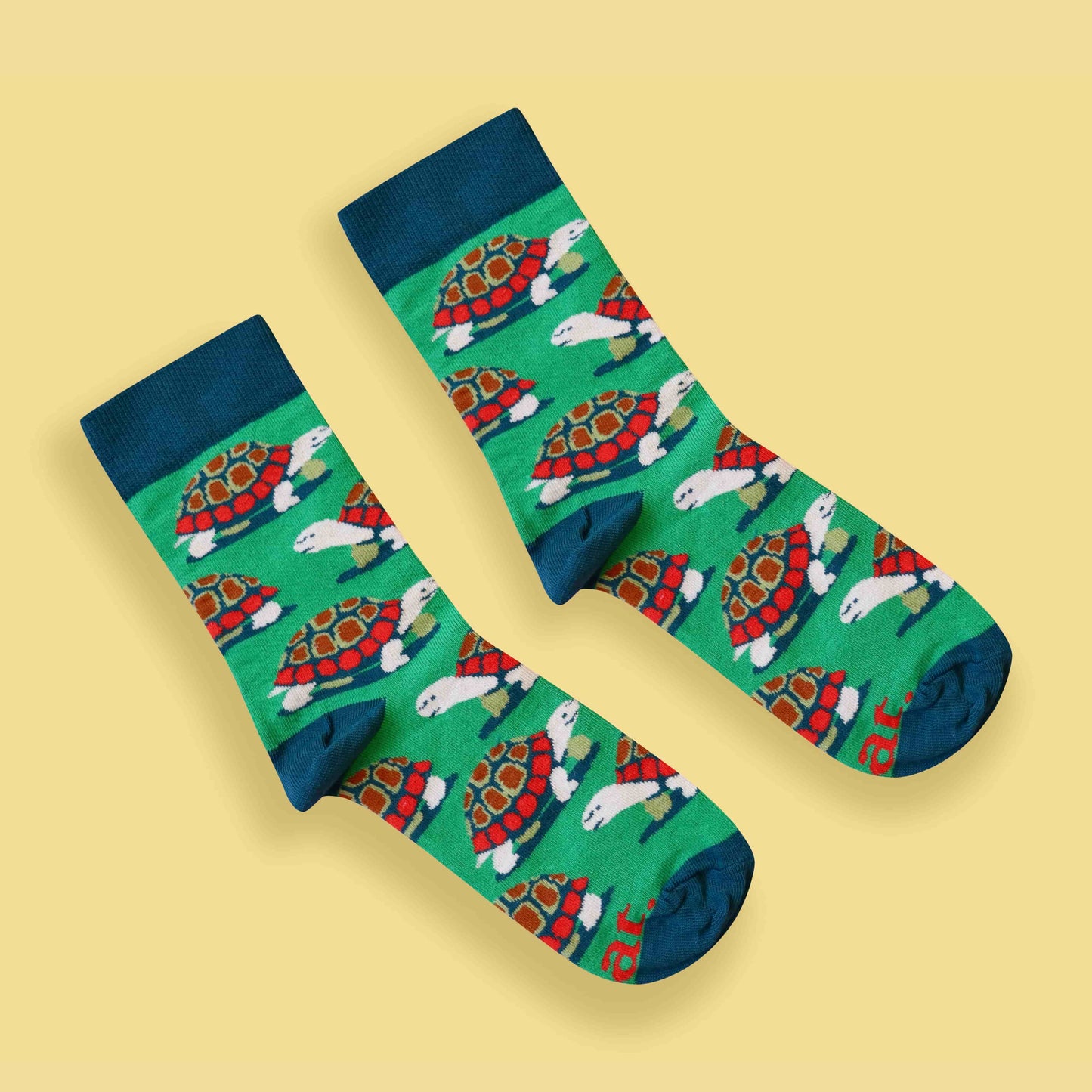 Tortoise socks yellow background diagonal