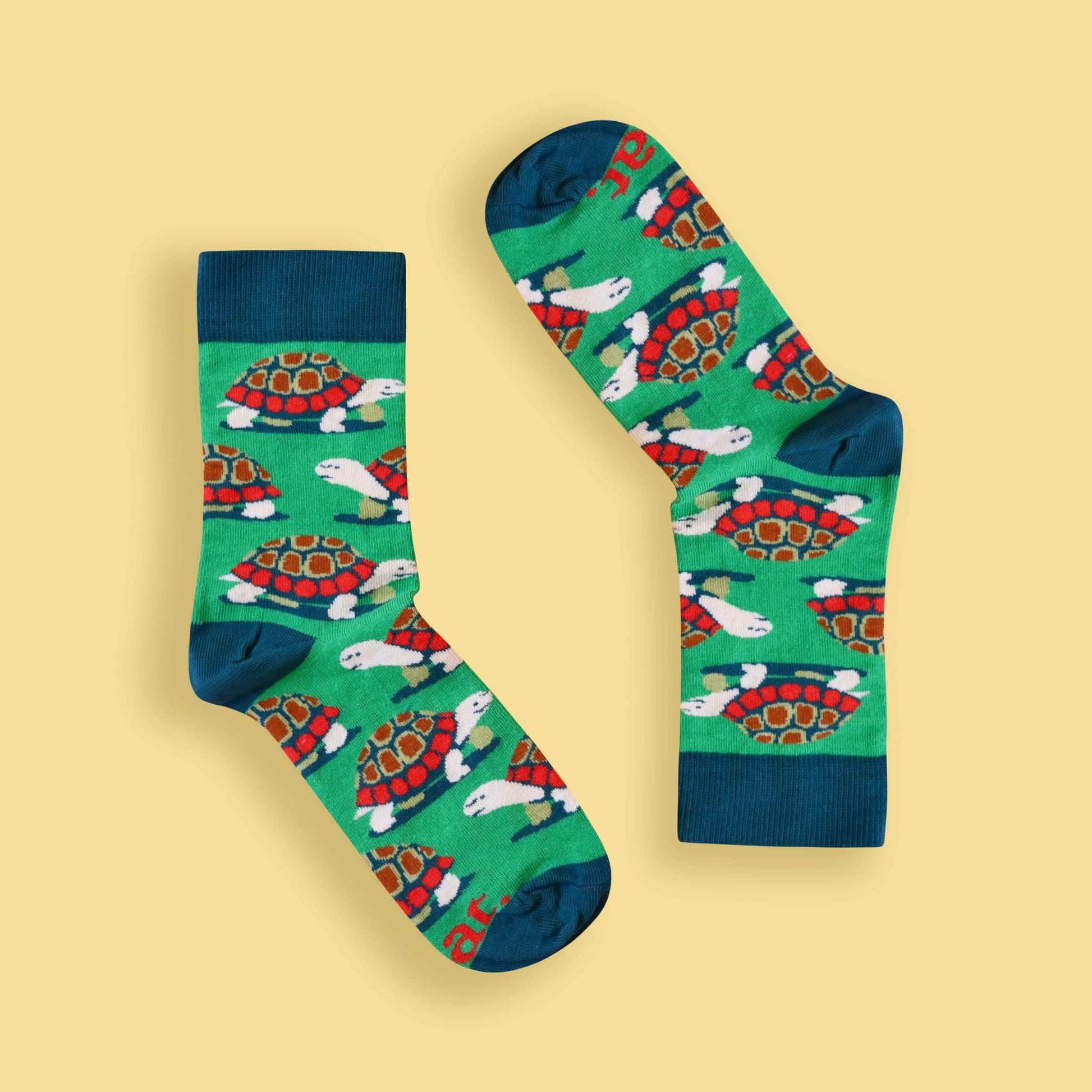 Tortoise socks yellow background inverted