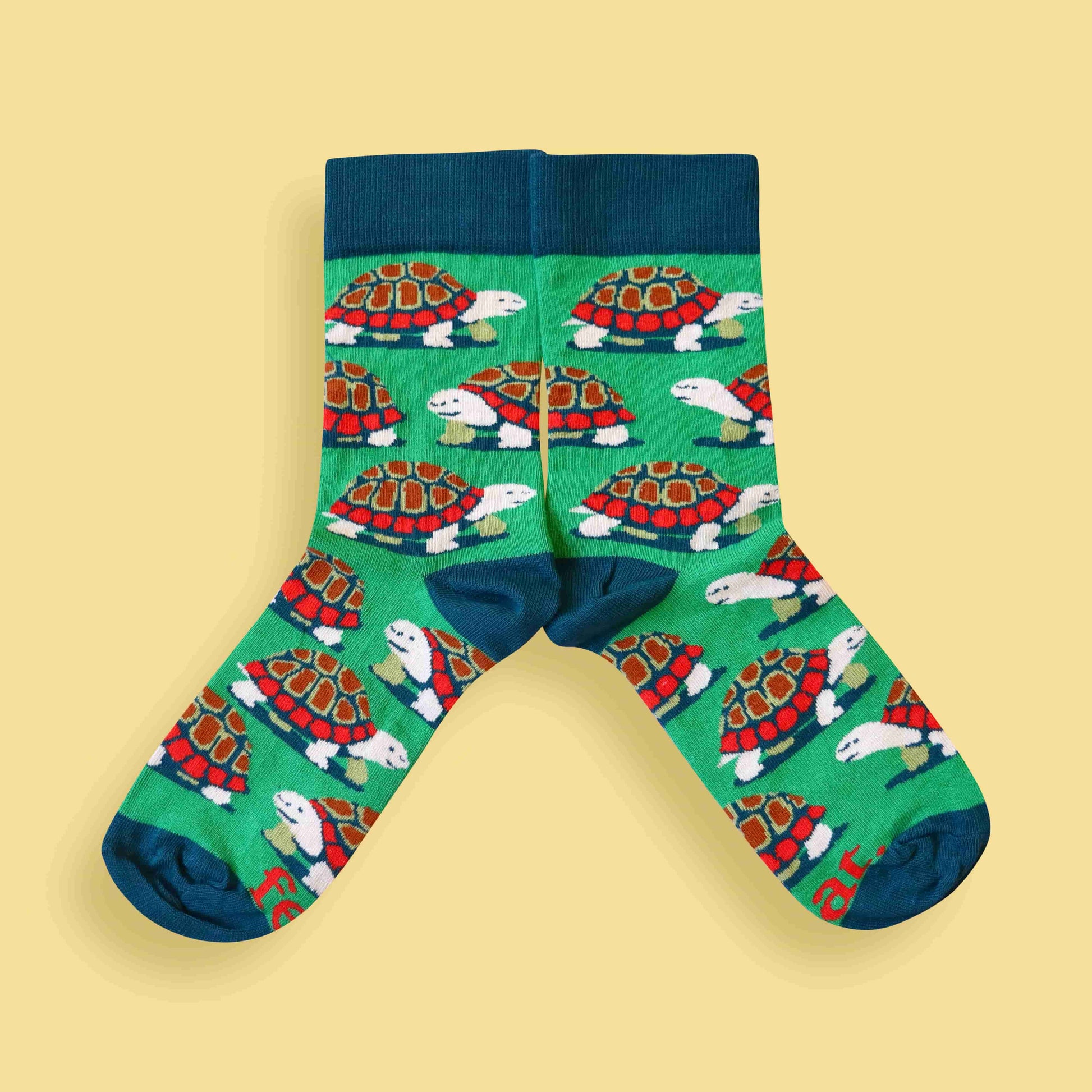 Tortoise socks yellow background mirrored