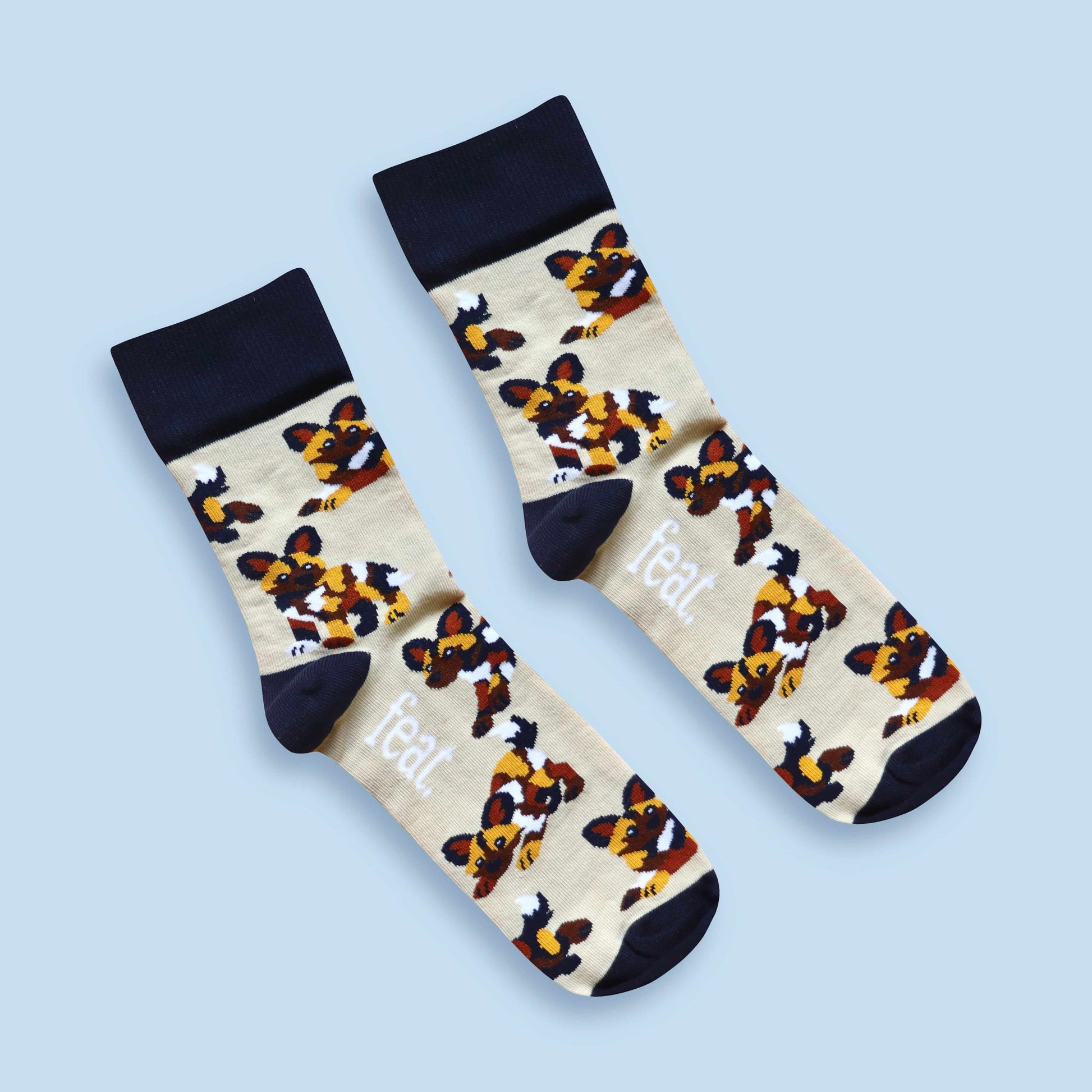 Painted dog socks blue background diagonal
