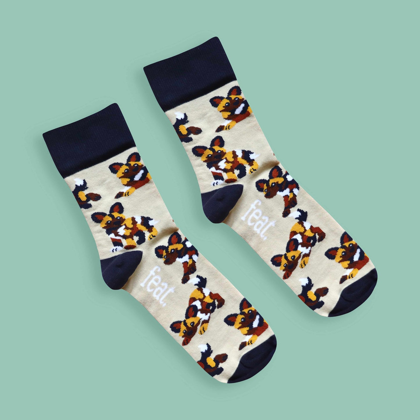 Painted dog socks green background diagonal