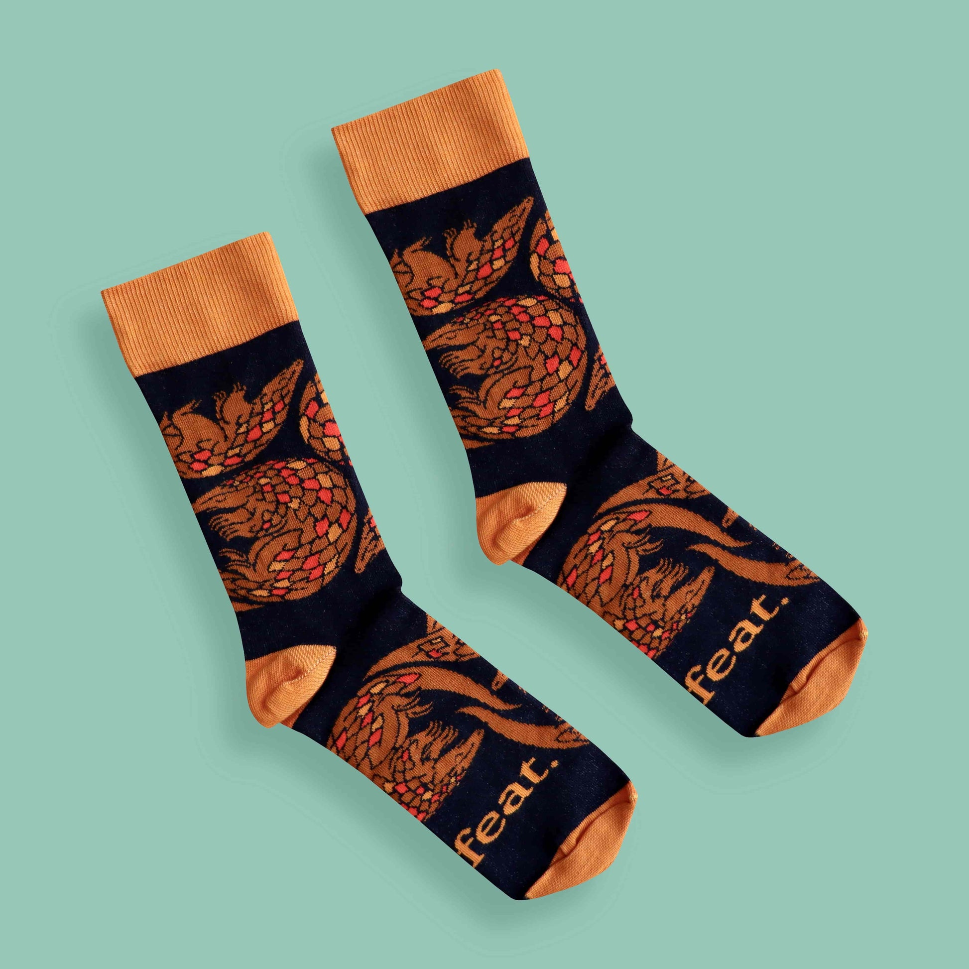 Pangolin socks green background diagonal