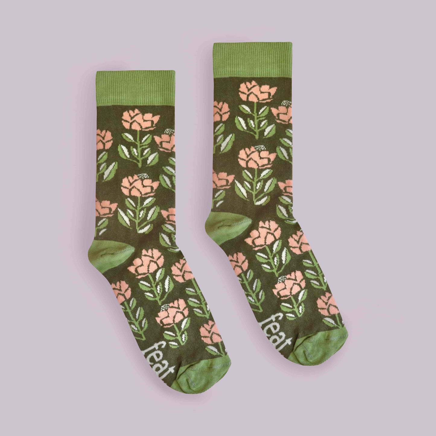 Peach protea socks lilac background centered