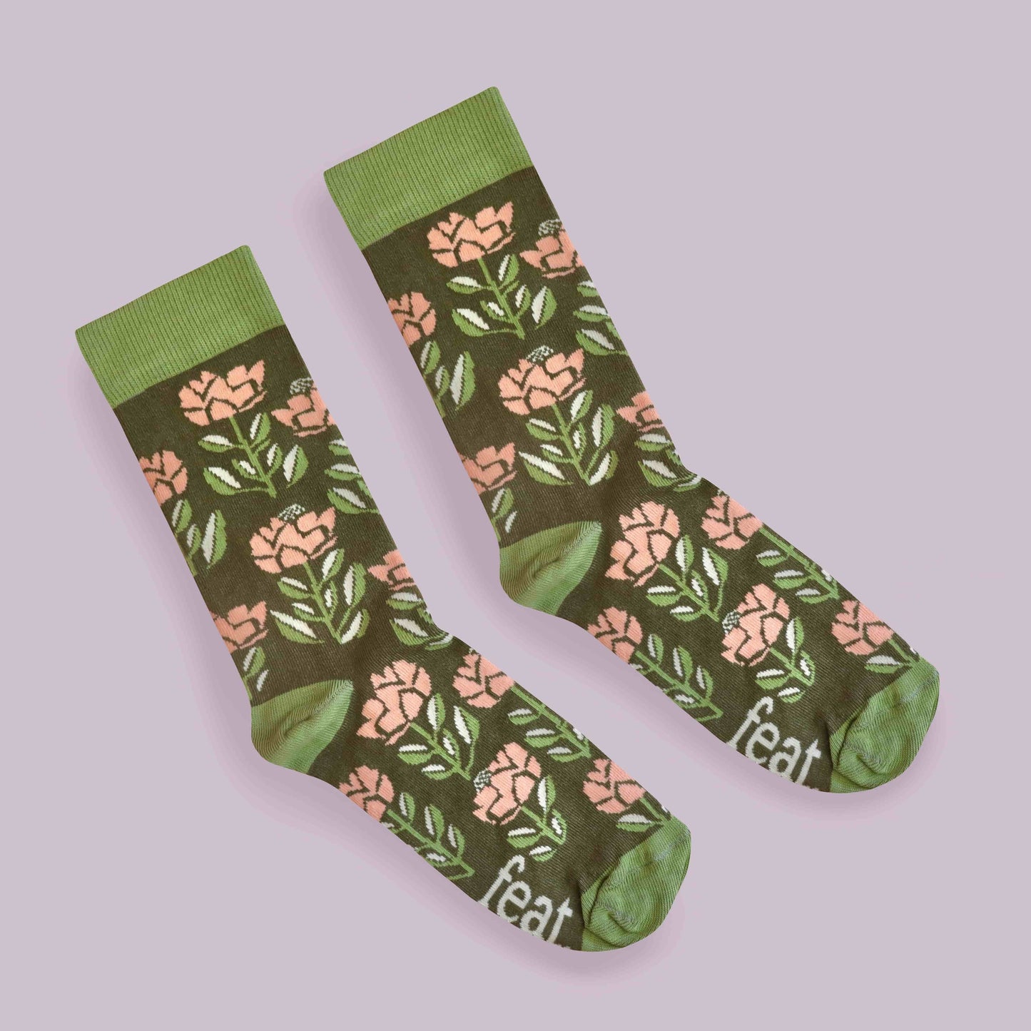 Peach protea socks lilac background diagonal