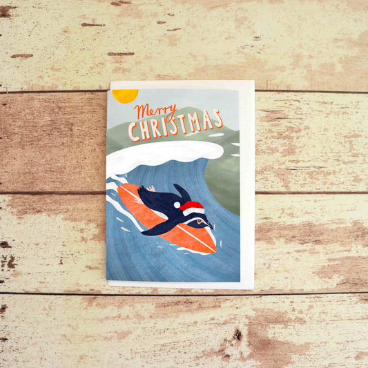 Surfing Christmas Penguin Greeting Card