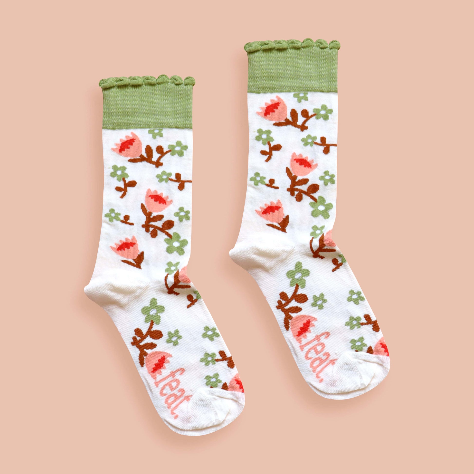 Cream protea socks pink background centered