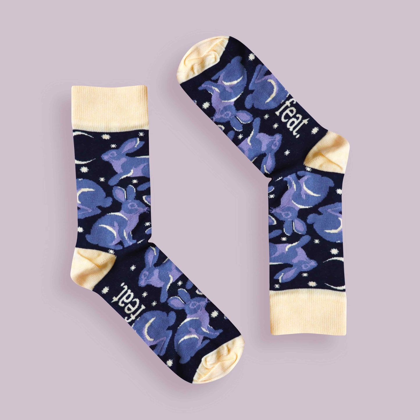 Riverine rabbit socks purple background inverted