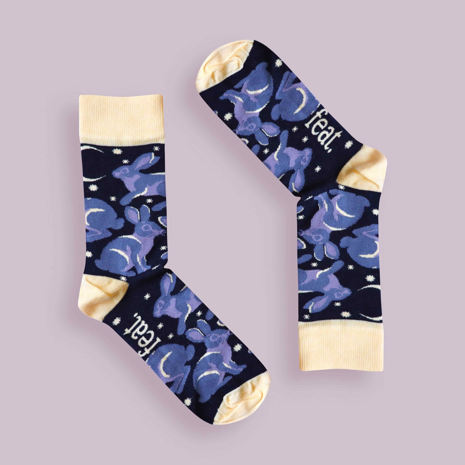 Riverine rabbit socks purple background inverted