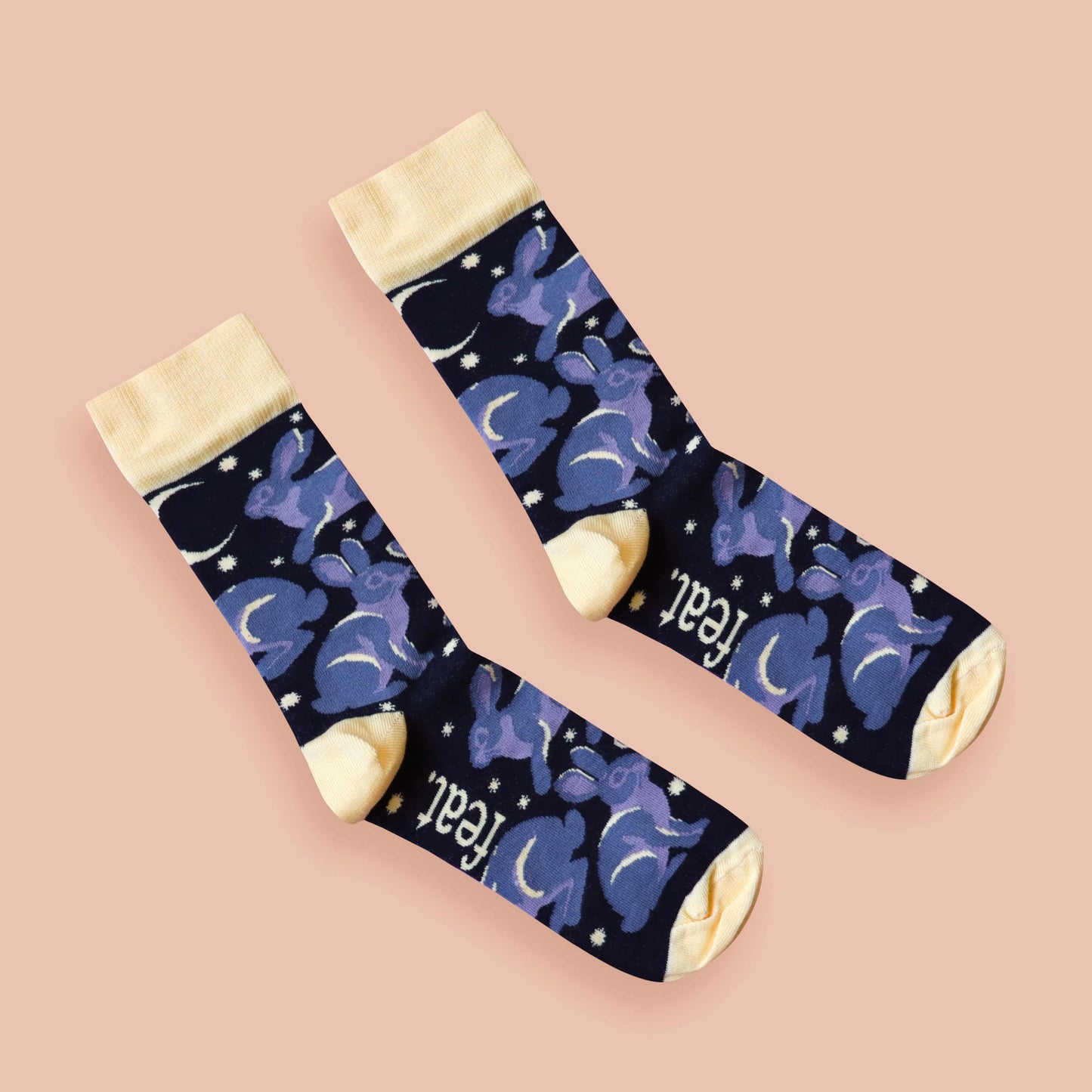 Riverine rabbit socks pink background diagonal