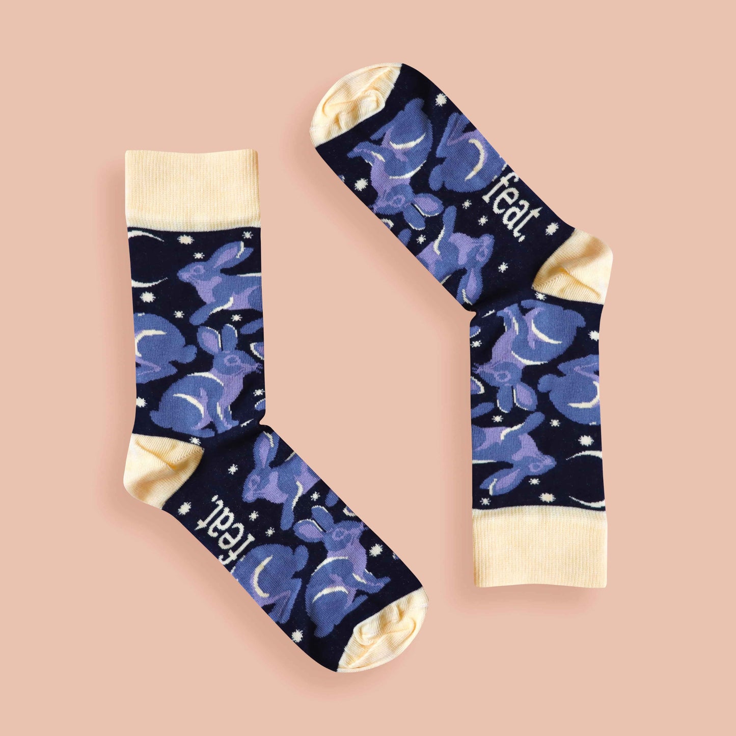 Riverine rabbit socks pink background inverted