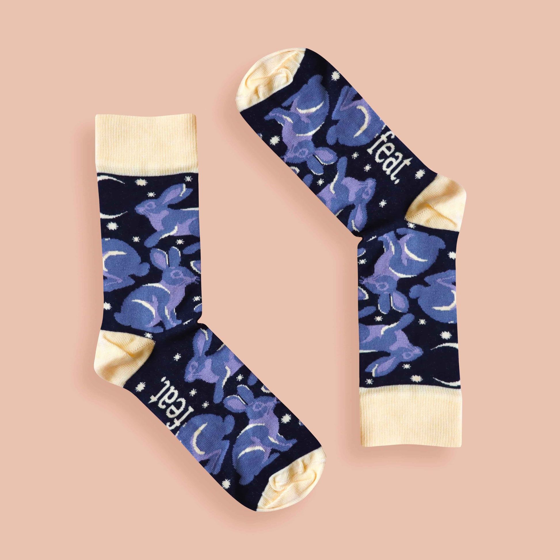 Riverine rabbit socks pink background inverted