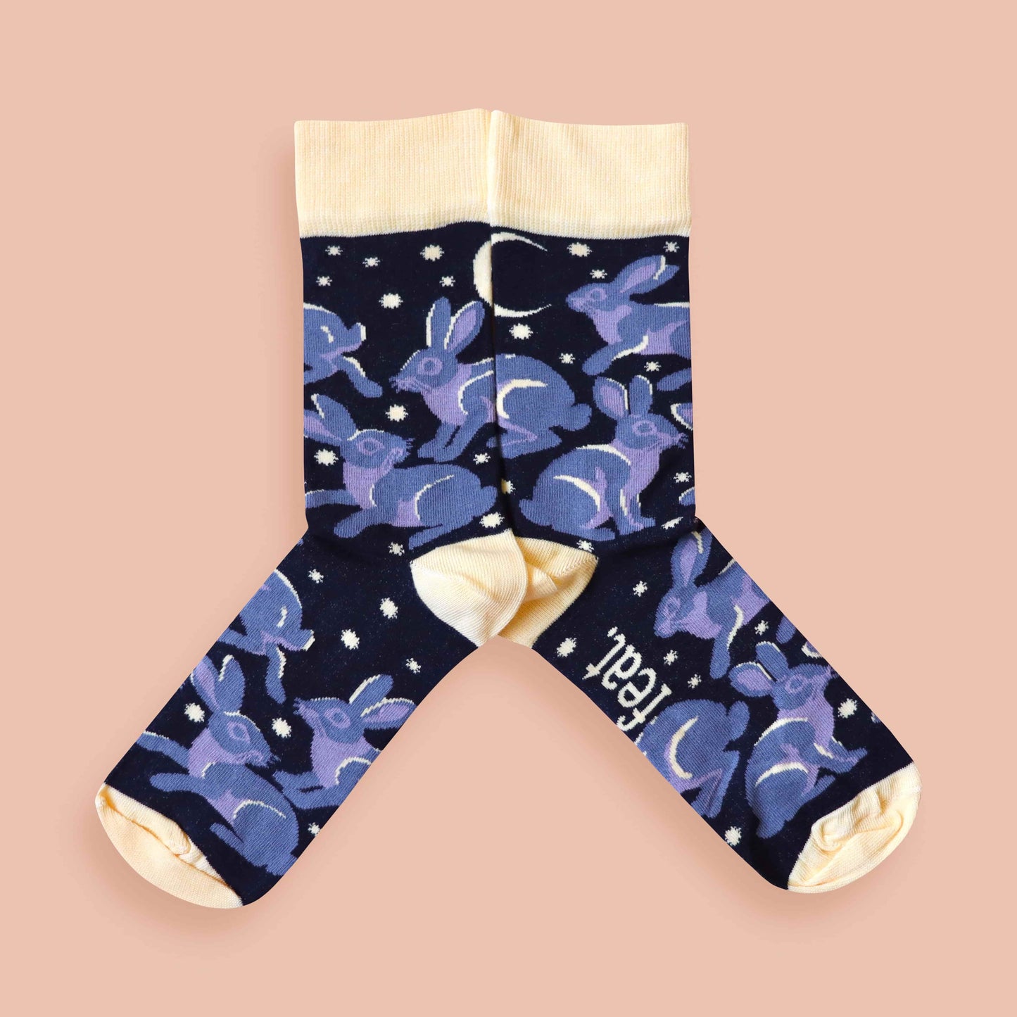 Riverine rabbit socks pink background mirrored