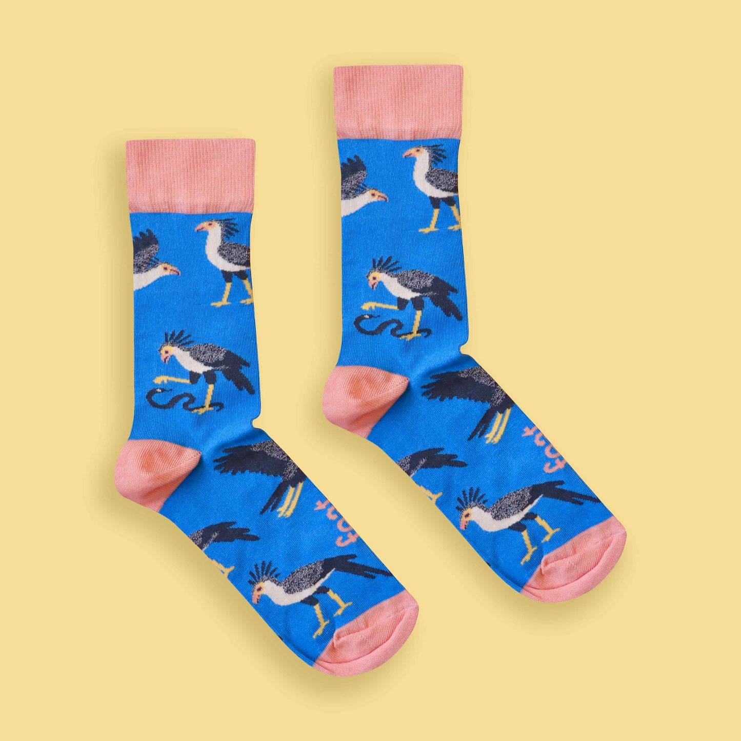 Secretary bird socks yellow background centered