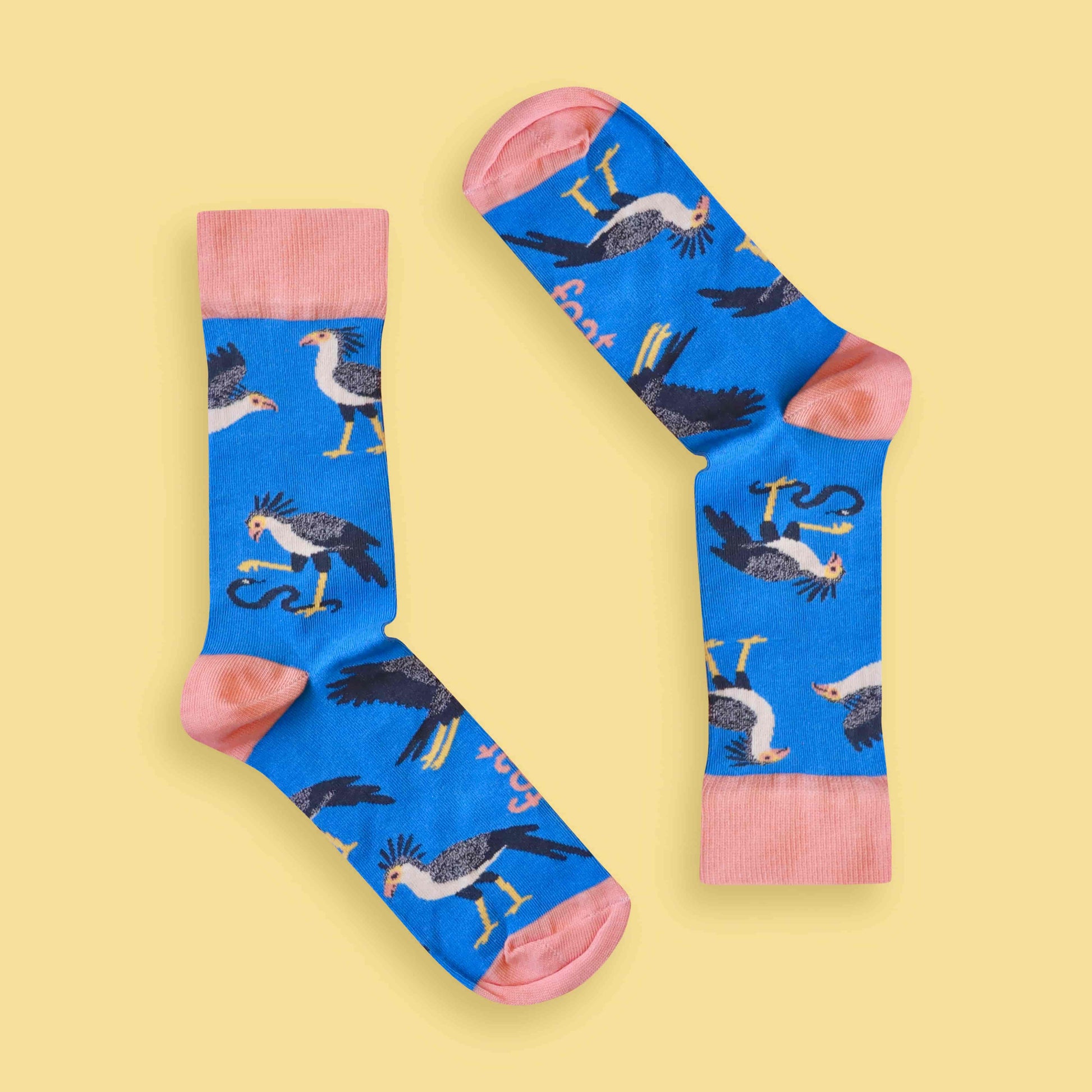 Secretary bird socks yellow background inverted