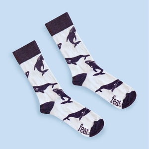 Whale socks diagonal image blue background