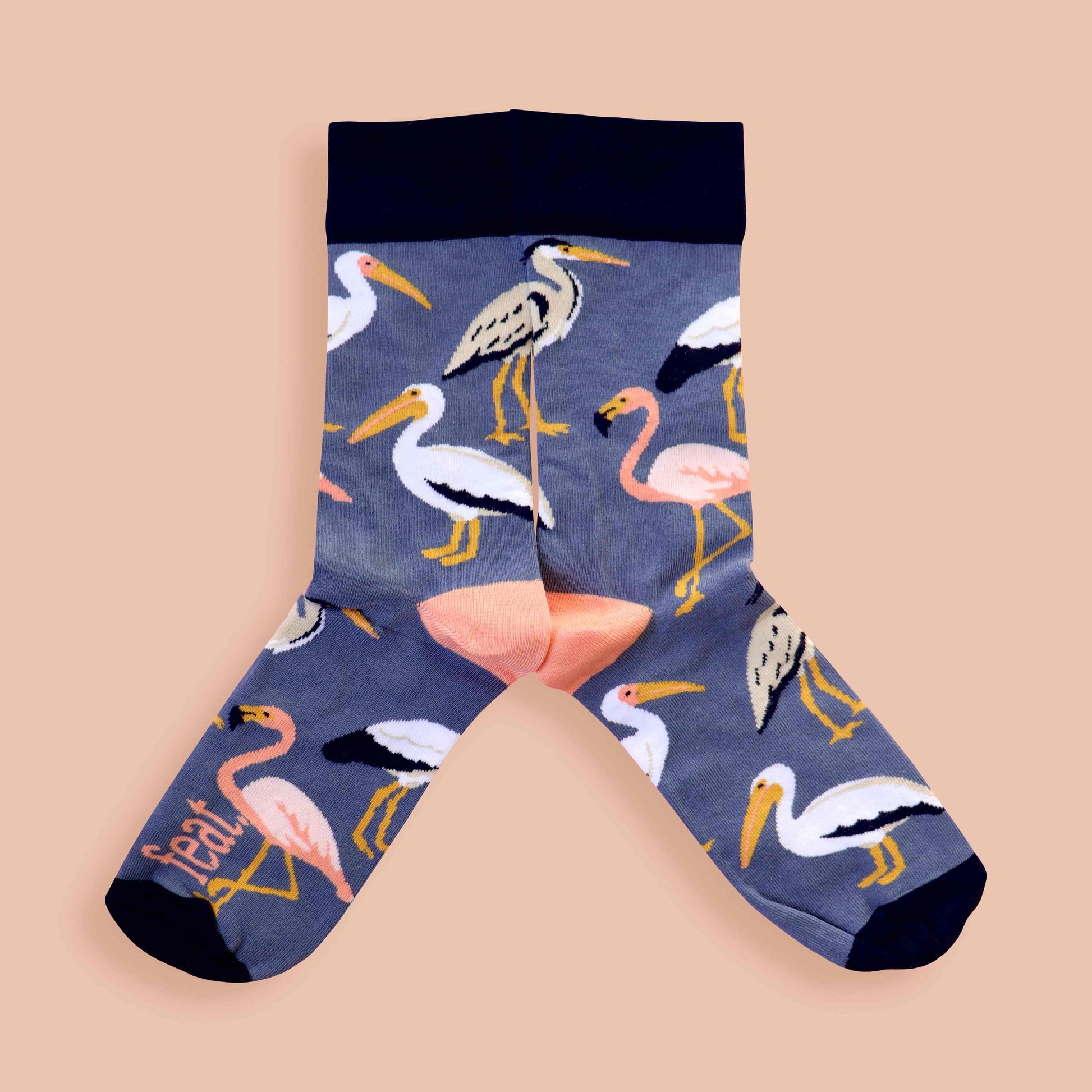Ladies wetland socks on pink background