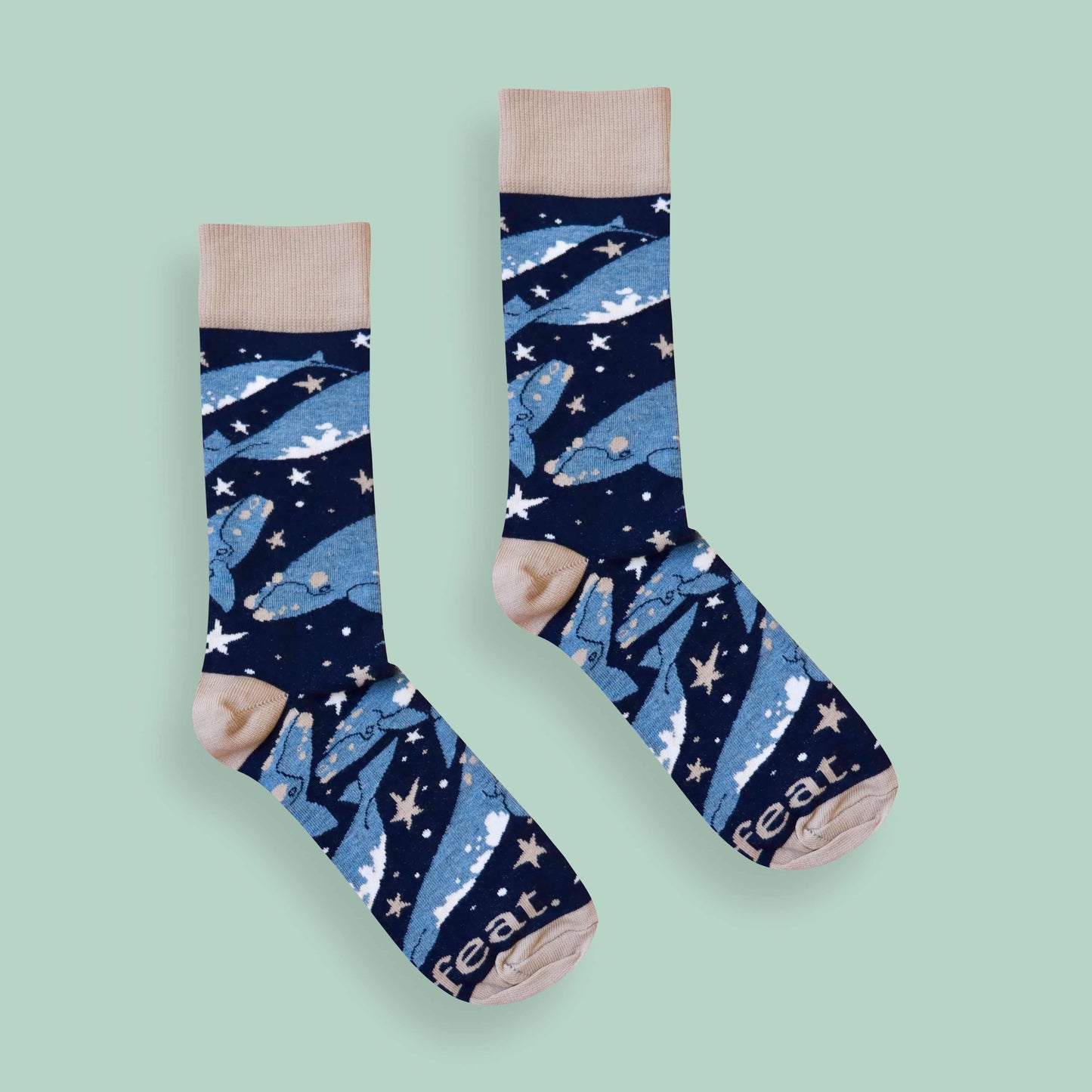 Whale socks green background centered