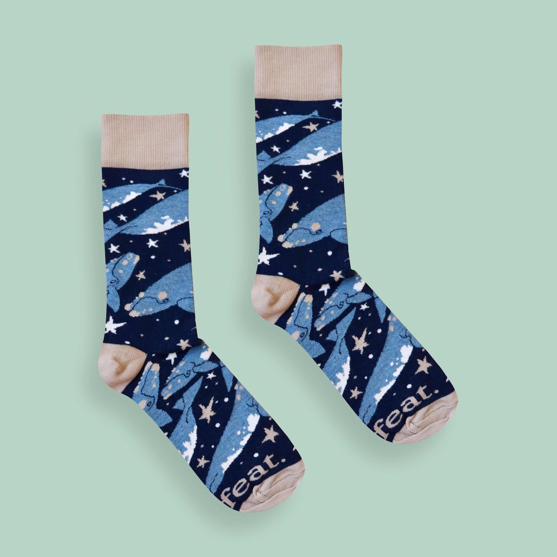 Whale socks green background centered