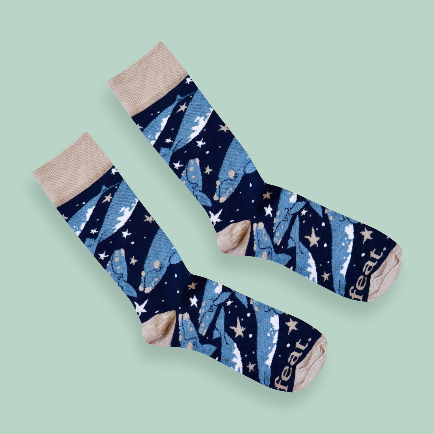 Whale socks green background diagonal
