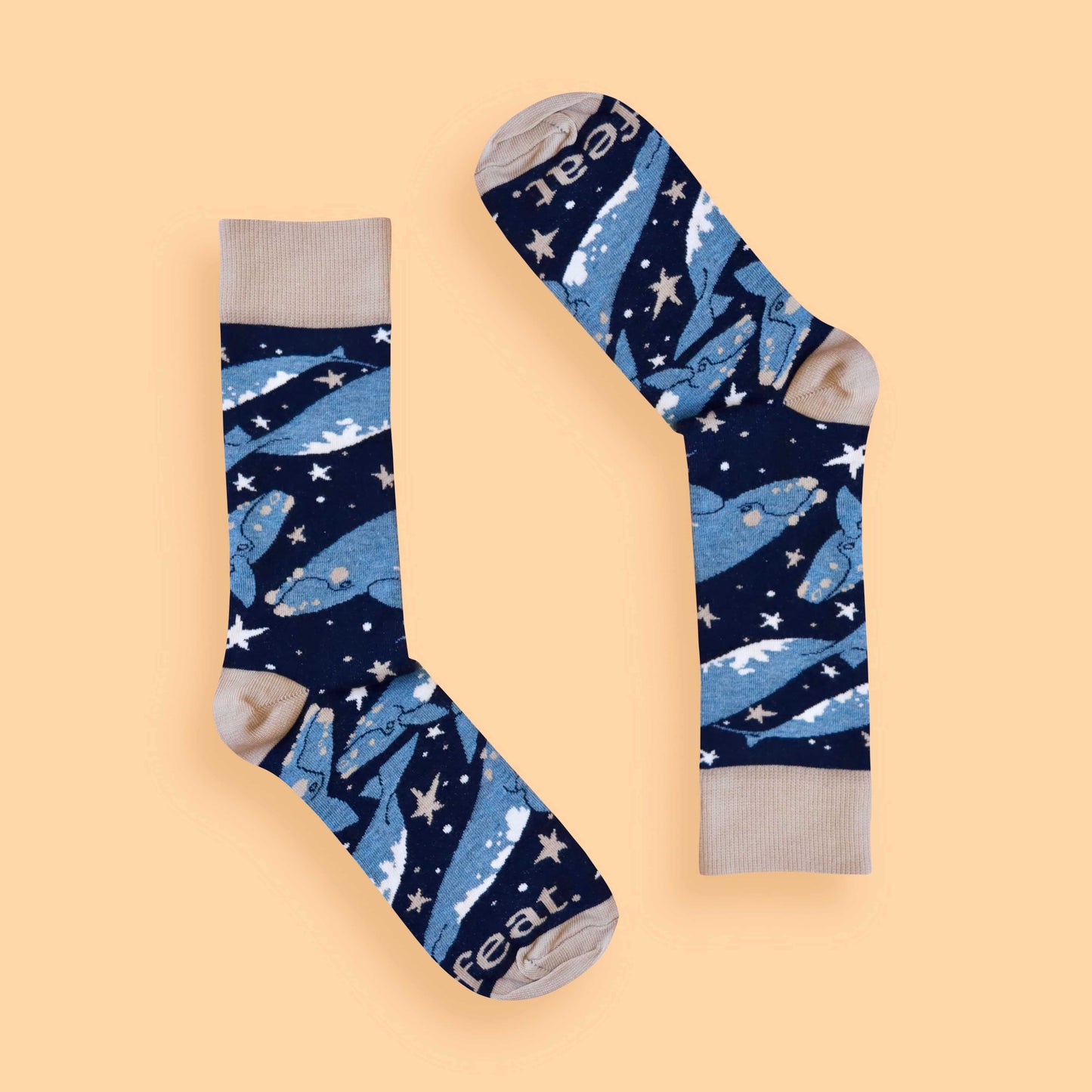 Whale socks peach background inverted