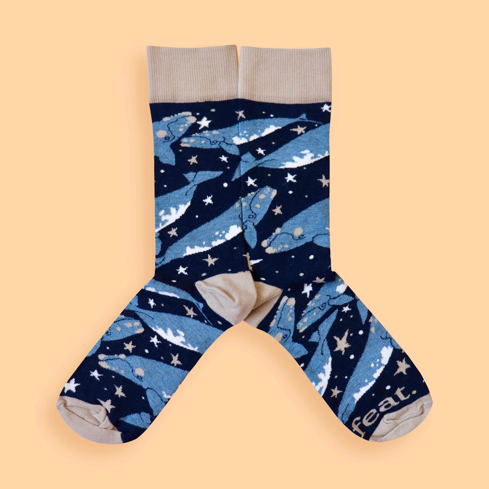 Whale socks peach background mirrored
